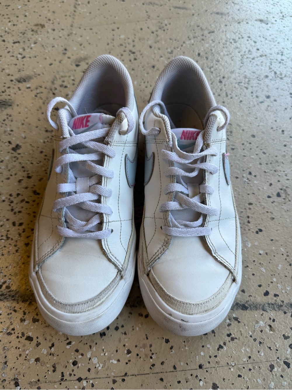 Nike White Low-Top Sneakers with Pink Logo